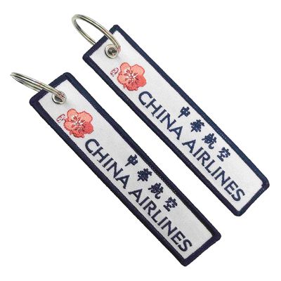 satın al Çift taraflı özel nakışlı anahtar etiketleri Hava Yolları Plum Blossom Insignia İki dilli online manufacture