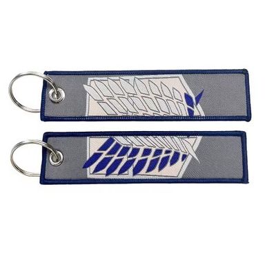 Buy Geometric Contrast Woven Keychain | Minimalist Grey-Blue Design + Sealed Edges + Premium Finish online manufacture