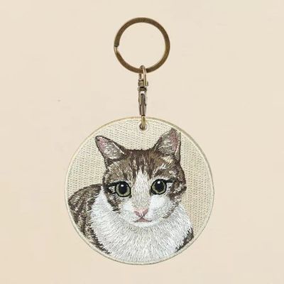 Buy Mischievous Cat Smile Woven Keychain - Purrfect Pet Lover Gift - Textured Fur & Jewel-Toned Eyes online manufacture