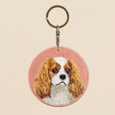 Buy Pocket-Sized Pup Perfection - Dual-Sided Woven Keyring - Blossom Accents & Silent Companion Vibes online manufacture