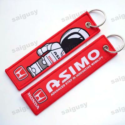 Buy ASIMO Robot Keychain Embroidered Design with Both Sides Sporty Metal Rings Upload Any Pattern Polyester Alloy Material online manufacture